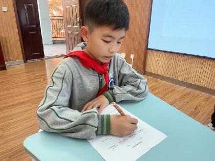 20250409四五年级看珠写数比赛新闻稿 (1)_html_49dd518c.jpg