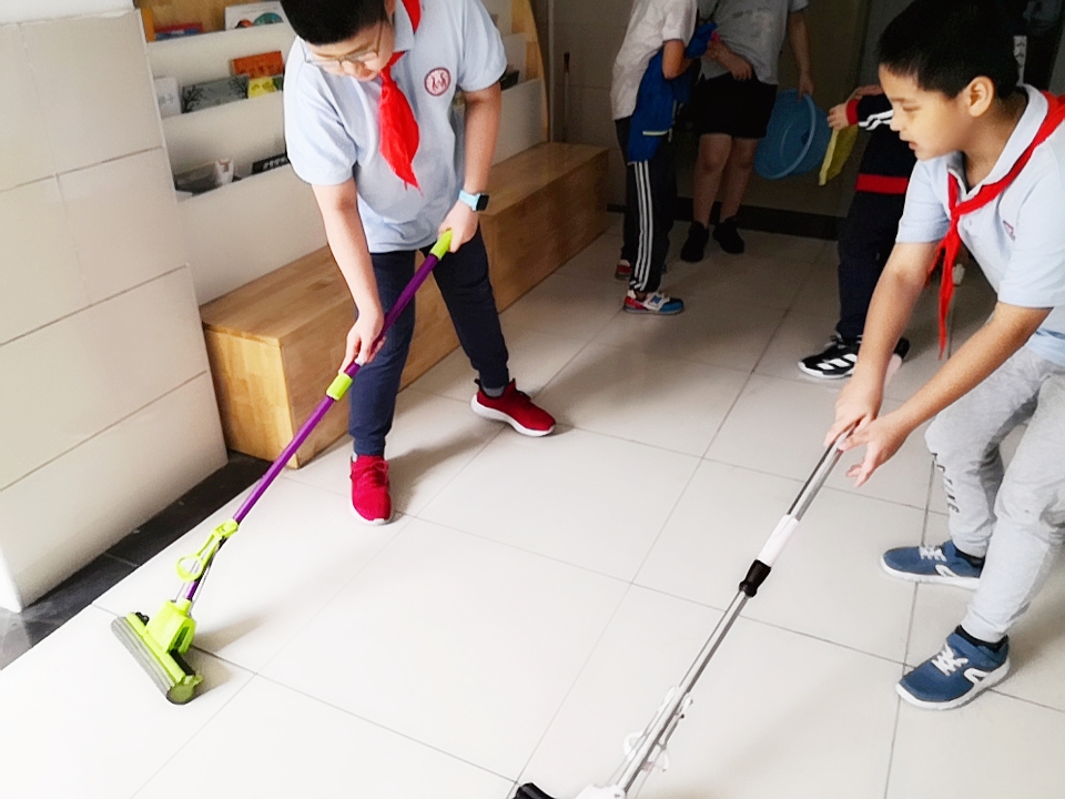 报道：校园因我而美丽(修改)_html_6fa2ceaf.jpg