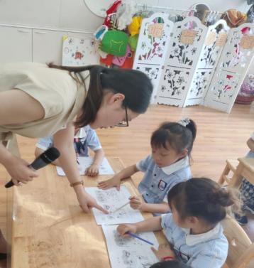 报道6.13送教迈幼三园_html_60b55192.jpg