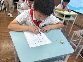 20250528魔幻数学节二年级校级赛新闻稿_html_m6cfa7dba.jpg