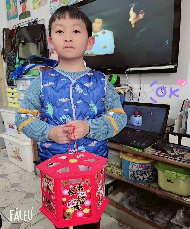 其乐融融迎佳节  虎虎生威闹元宵——晓院附小二（3）班开展元宵节生活实践活动_html_4861108.jpg