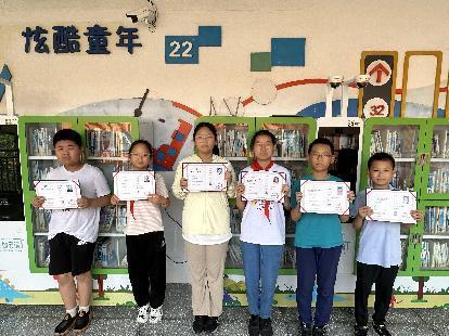 20230625珠心算考级证书颁发报道_html_m7edadb12.jpg