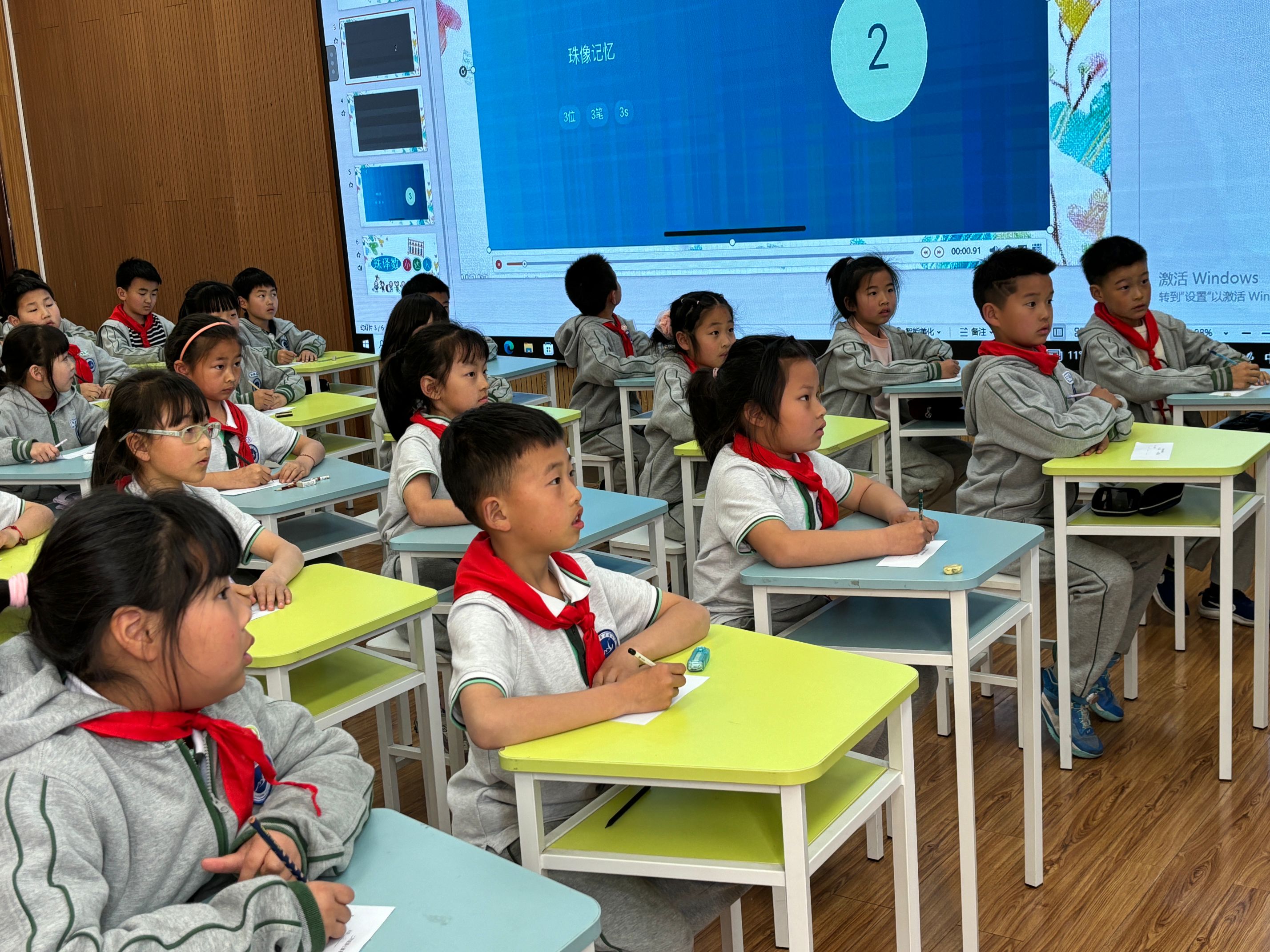 20250402二年级看珠写数新闻稿_html_397fc8ec.jpg