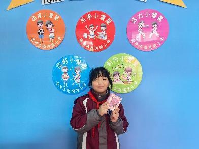 绚丽五彩券，快乐童真心——南湾营小学10月份童星驿站兑换活动_html_m1e7376bc.jpg
